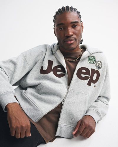 Sudadera con capucha y cierre estampada