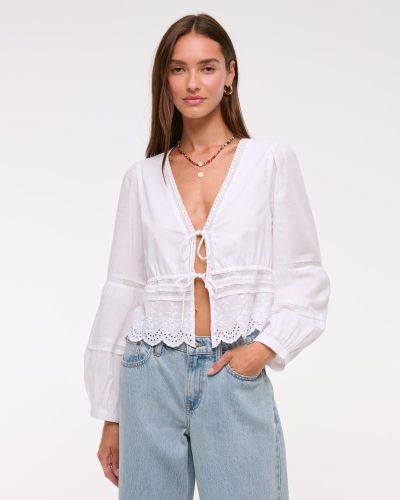 Top de manga larga con lazo frontal